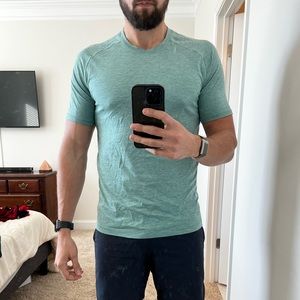 Lululemon Tshirt. Metal vent tech. Medium pictured. Sea foam green in color.